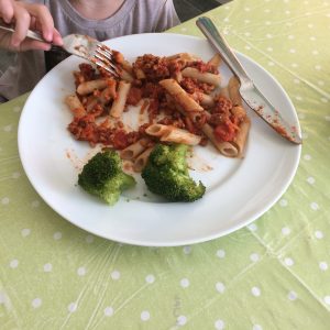 my daughter enjoying her pasta bolognese made with vegan, organic mince Sunflower Hack