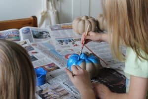 painting teal pumpkin