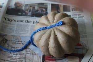 wrap teal pumpkin with wool