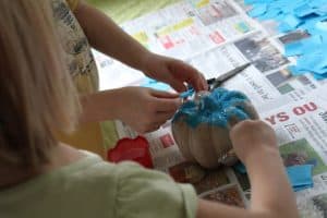 cover teal pumpkin with tissue paper