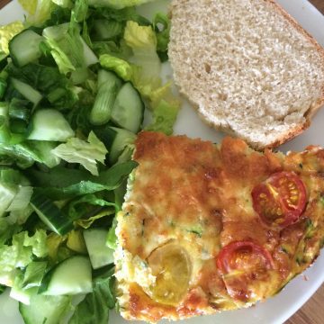 baked omelette with bread and salad