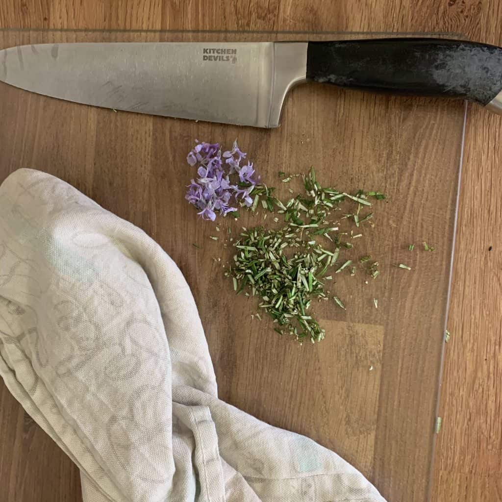 rosemary flowers and chopped leaves